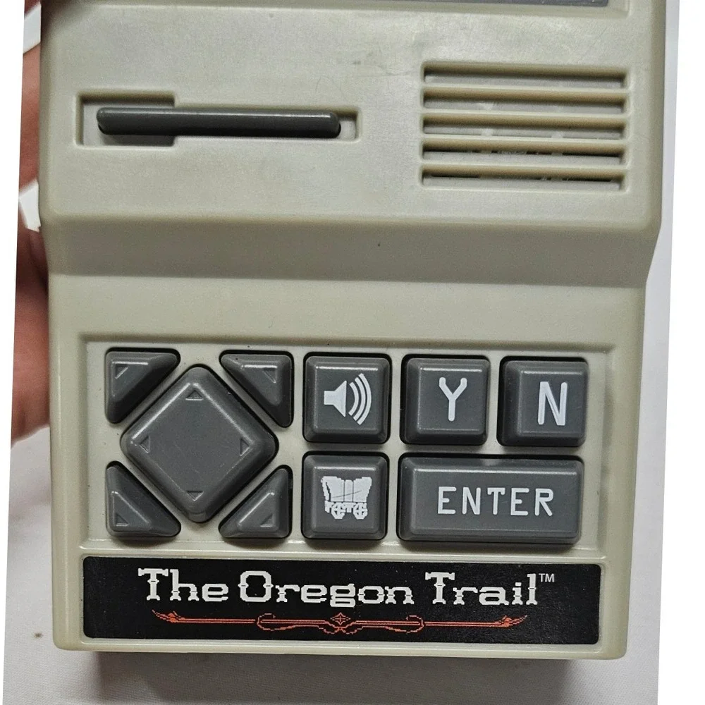 Basic Fun The Oregon Trail Handheld Electronic Game Retro 09597 Tan Color Screen
